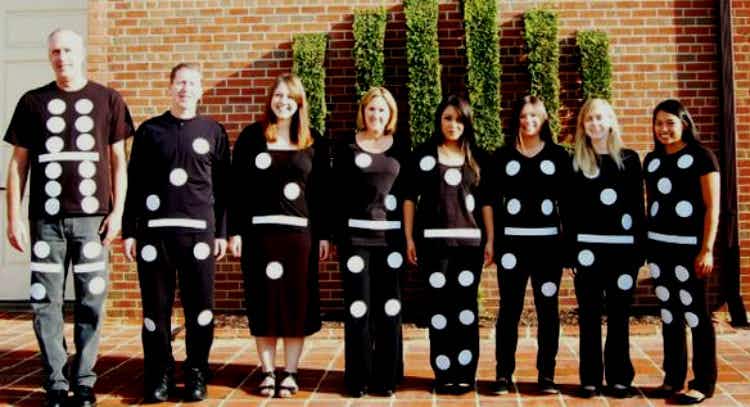  Have your friends wear all black with glued-on white dots and go as a set of dominos.