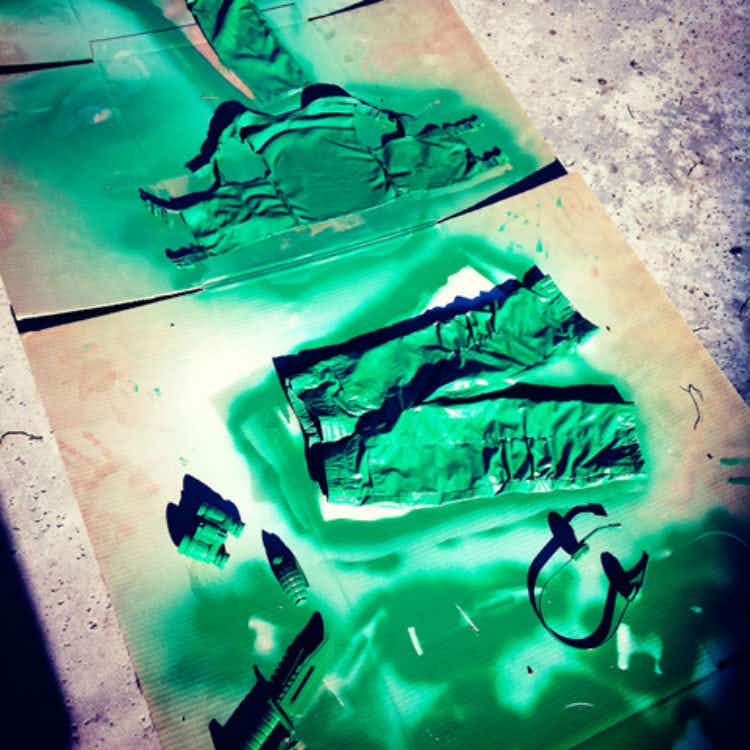 Spray paint old clothes green for a toy soldier costume.