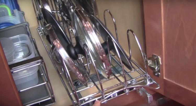 Use a lid rack to organize them.