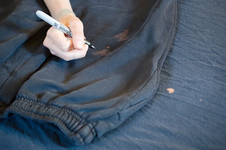 Use a Sharpie to hide bleach marks on black clothing.
