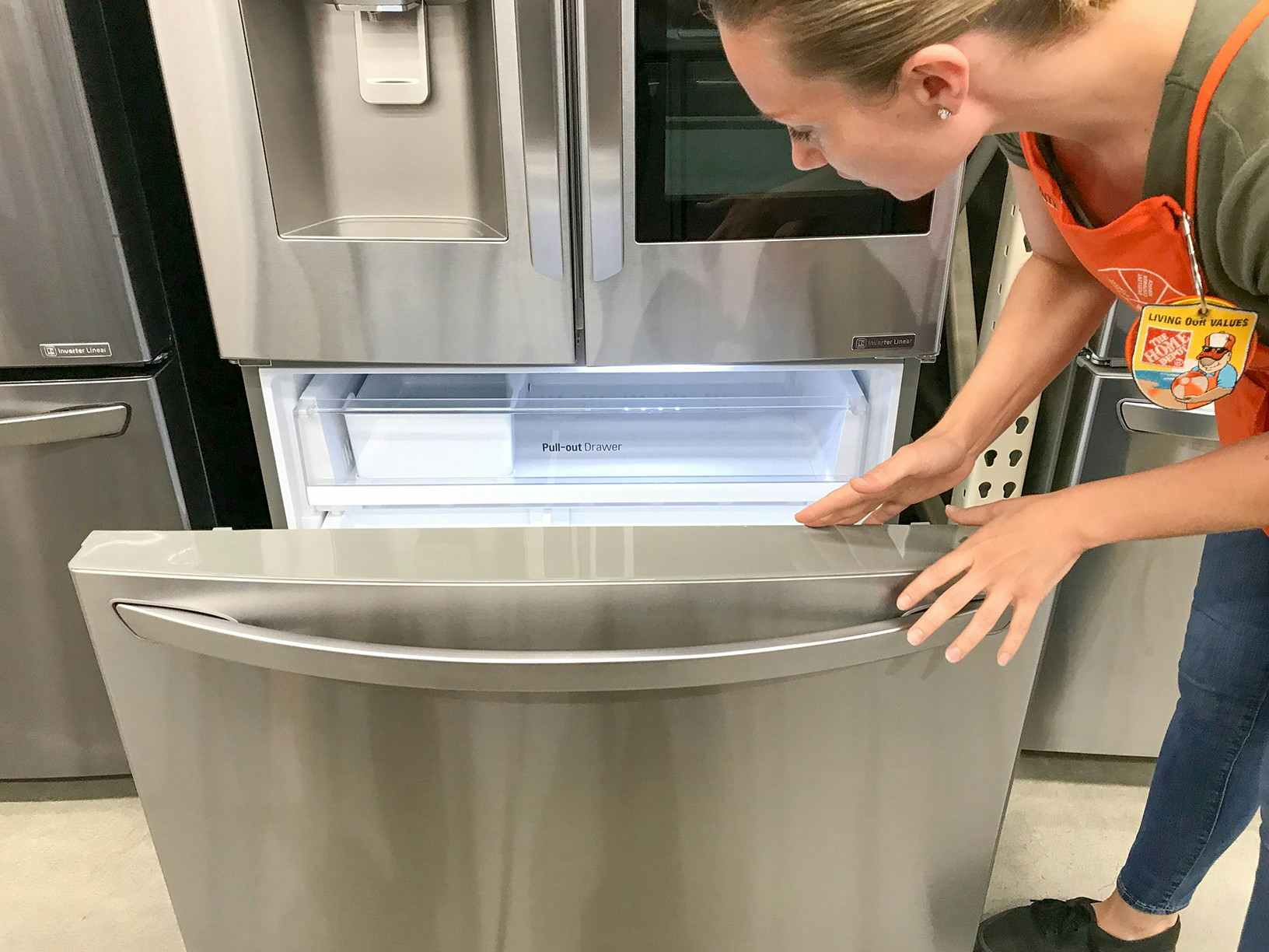 Home Depot worker opening freezer