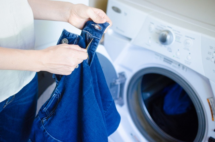 Zipping up all zippers and tying all drawstrings will prevent snags in the washing machine.