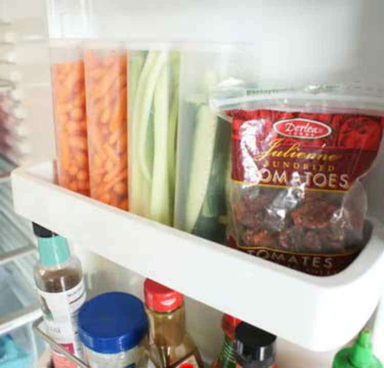 Reuse Crystal Light containers to store food in refrigerator shelves.