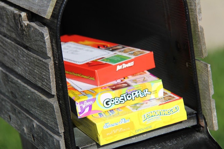 Stick a few stamps on a box of candy.