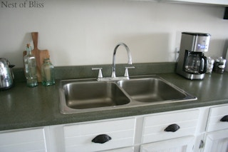Spray paint your countertop a faux granite.