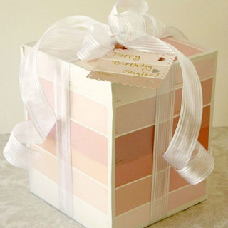 Use paint chips for wrapping paper.