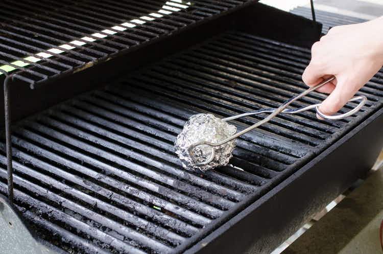 Clean a BBQ grill with a ball of foil.