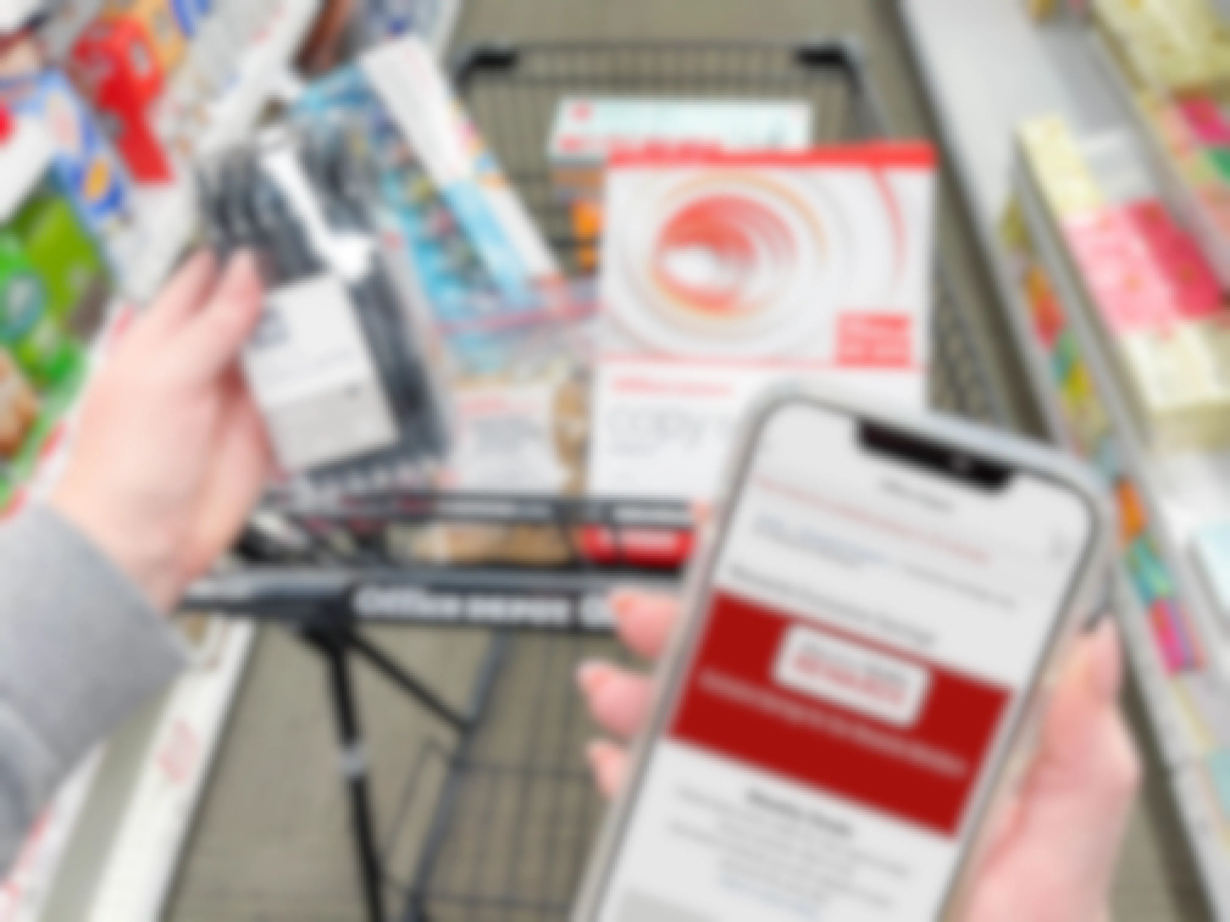 woman holding cellphone with office depot app while shopping