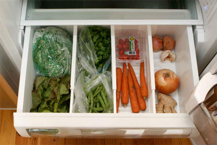 Via EnjoOrganize the vegetable compartment with drawer organizers.y this Beautiful Day