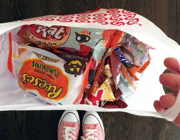 Halloween candy in a Target shopping bag.