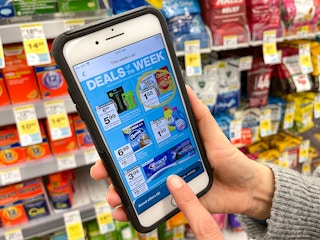 A person clicking on a deal on the Walgreen's app.