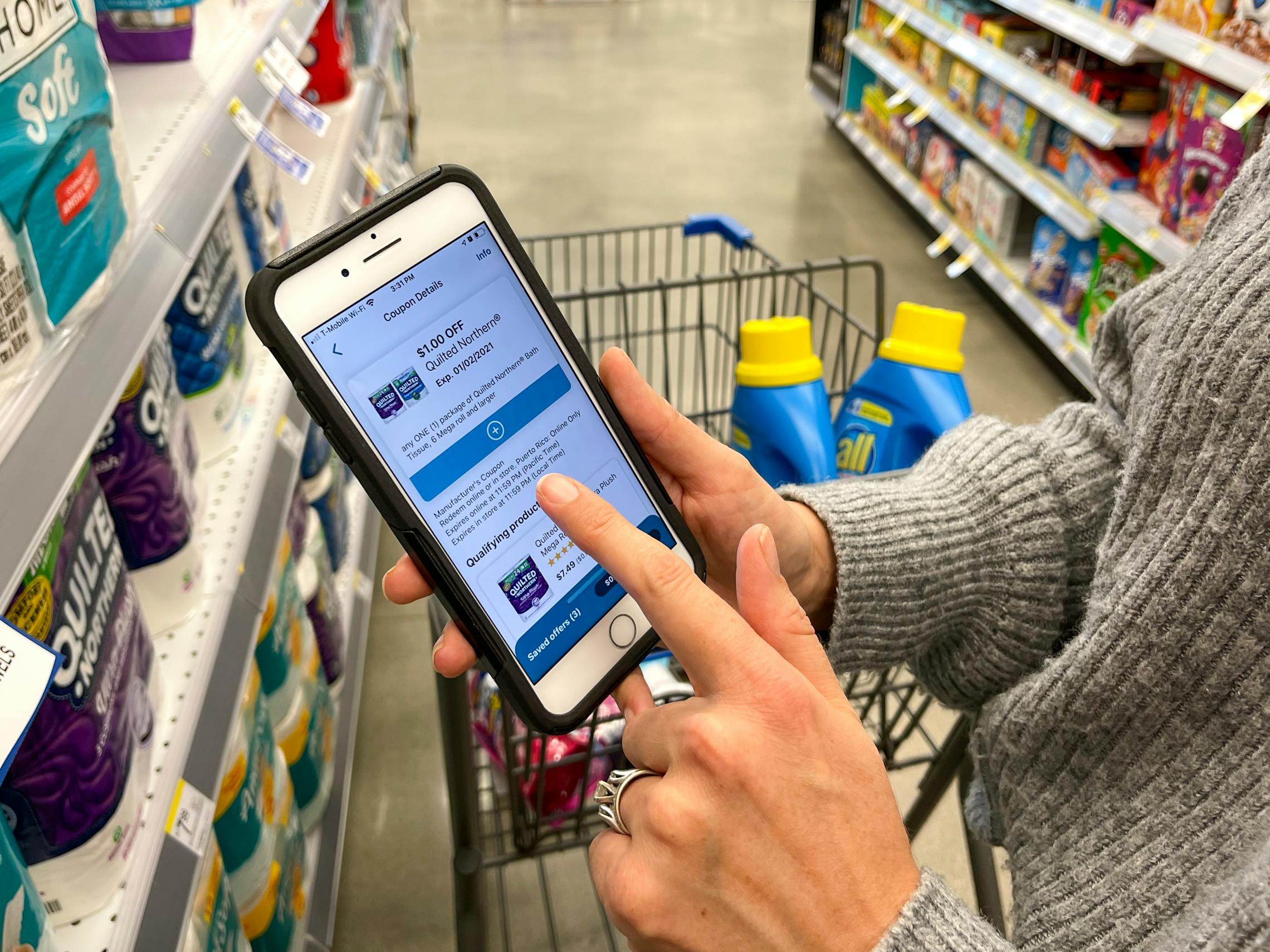 Woman adding digital Walgreens coupons on app