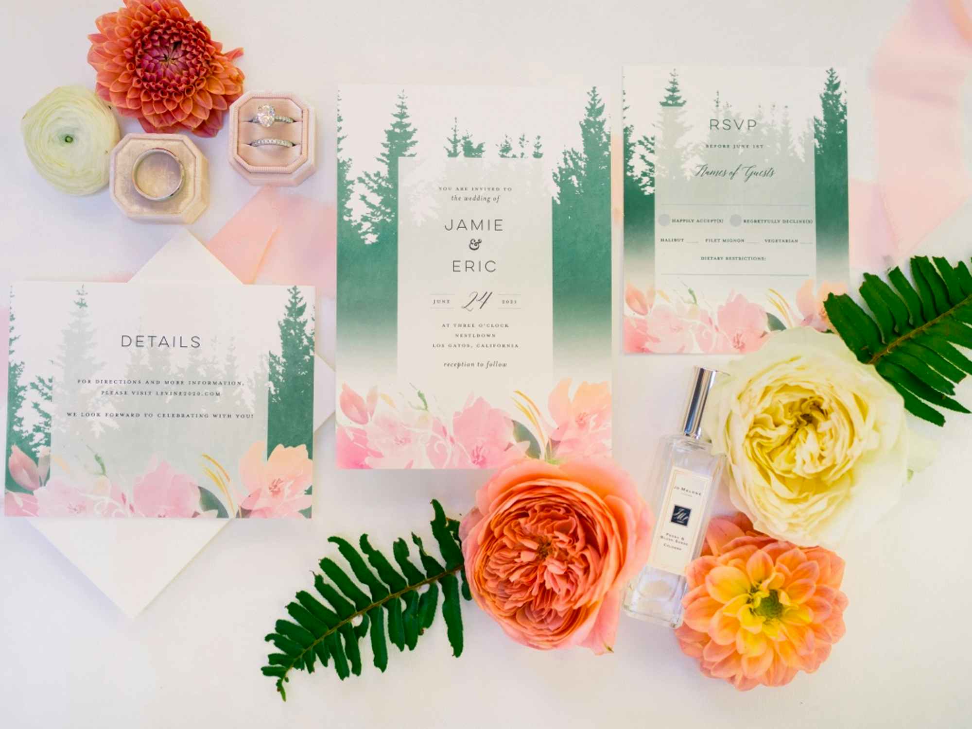 Custom wedding invitations from Wedding Chicks, laid out with some flowers