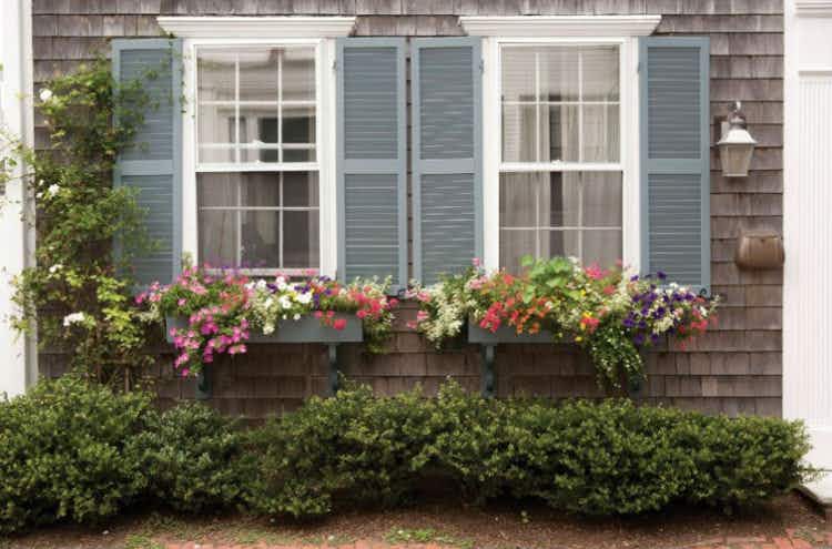 Add window boxes to the front of your house.