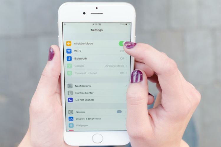 someone turning on airplane mode on phone