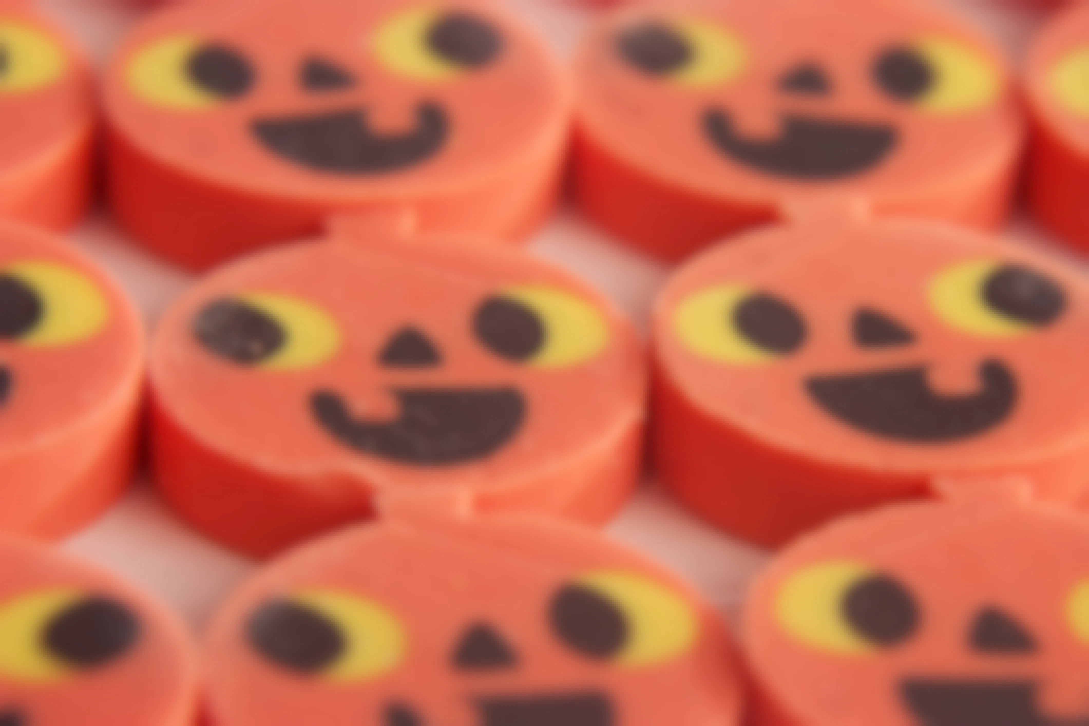 A close-up on pumpkin shaped erasers.