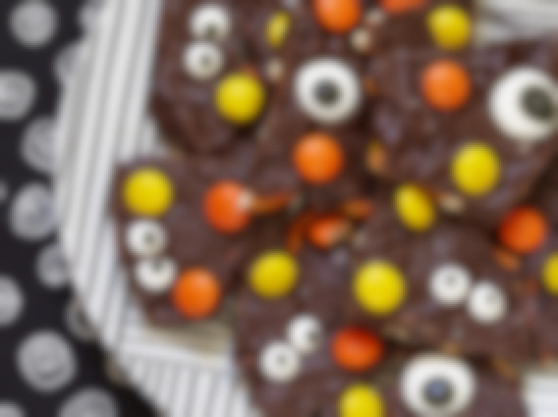 A plate of chocolate bark made with Reese's pieces.