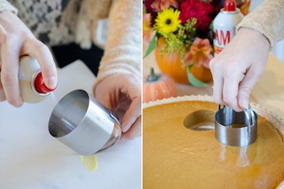 A person spraying cooking oil onto a biscuit cutter and using it to cut mini-pies out of a large pumpkin pie.