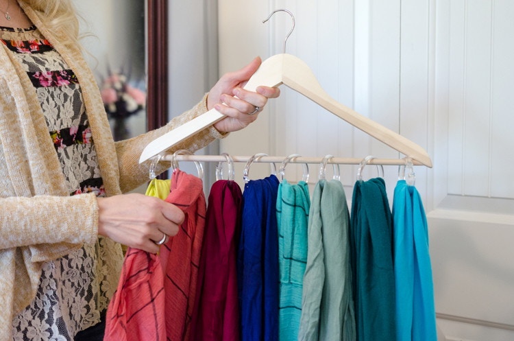Scarves hung on a hanger with shower curtain rings
