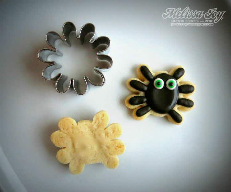 Turn flower cookie cutters into spiders.