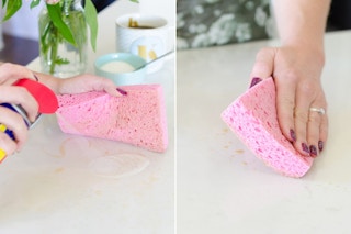 WD-40 being sprayed on a kitchen counter then someone wiping with a sponge