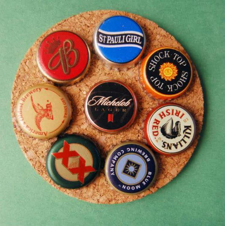 Make coasters with old bottle caps.