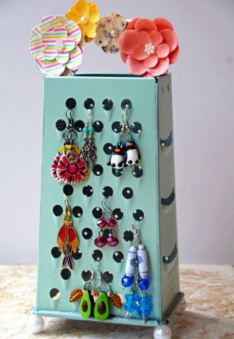 Turn a cheese grater into an earring holder.