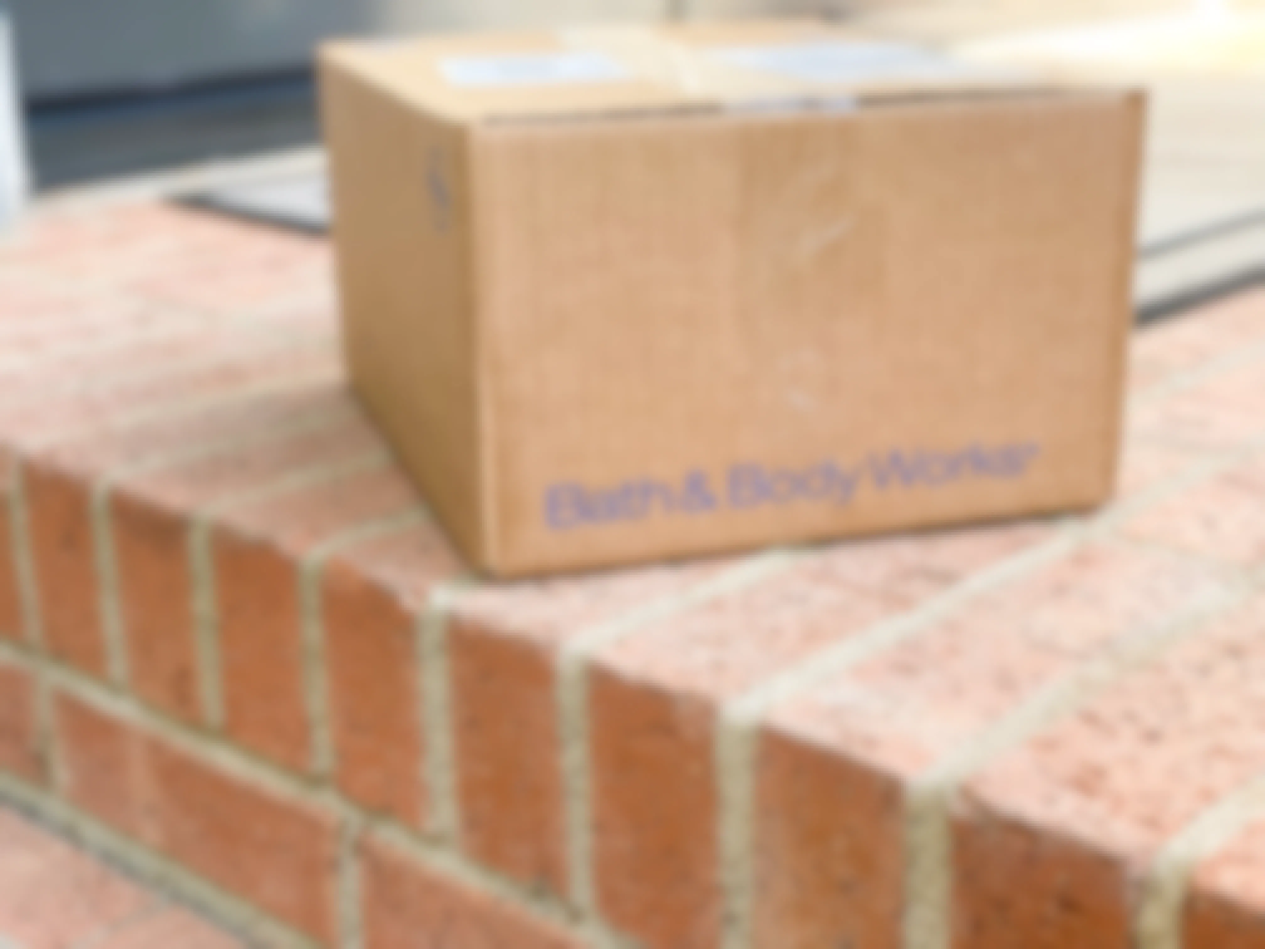 bath and body works shipping box on front step