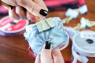 Or use a binder clip to keep a ribbon roll secure.