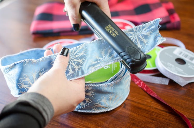 Get creases out of ribbon with a flat iron.