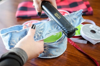 Get creases out of ribbon with a flat iron.
