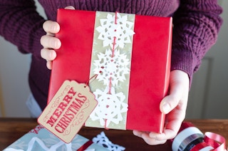 Have kids cut out snowflakes and use them as gift toppers or tags.