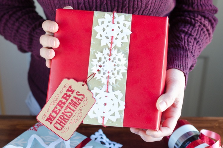Have kids cut out snowflakes and use them as gift toppers or tags. 