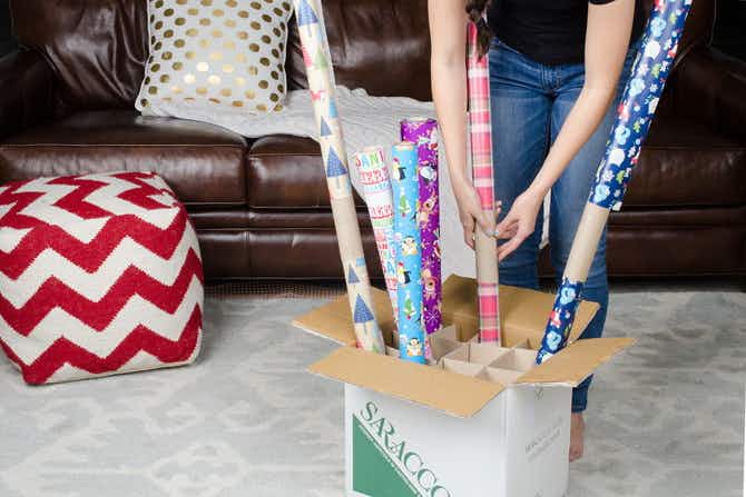Organize your gift wrapping station with a wine box.