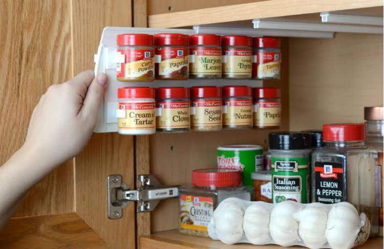 Install a pull-out spice rack in your cabinets.