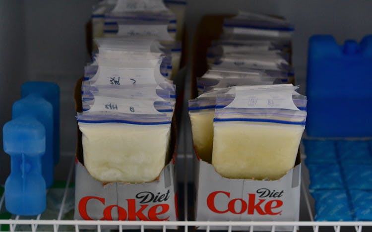 Store frozen breastmilk in 12-pack soda boxes.