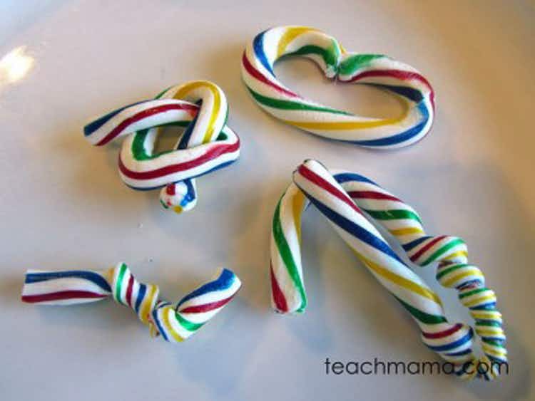 Several candy canes bent into different shapes.