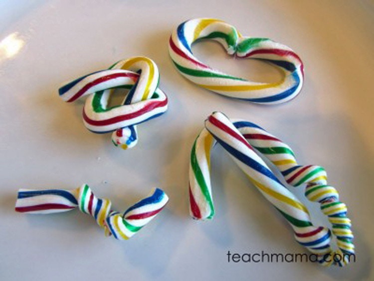 Several candy canes bent into different shapes.
