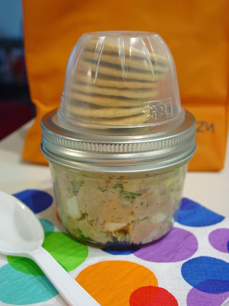 Attach clean fruit cups to the them to hold lunch crackers.