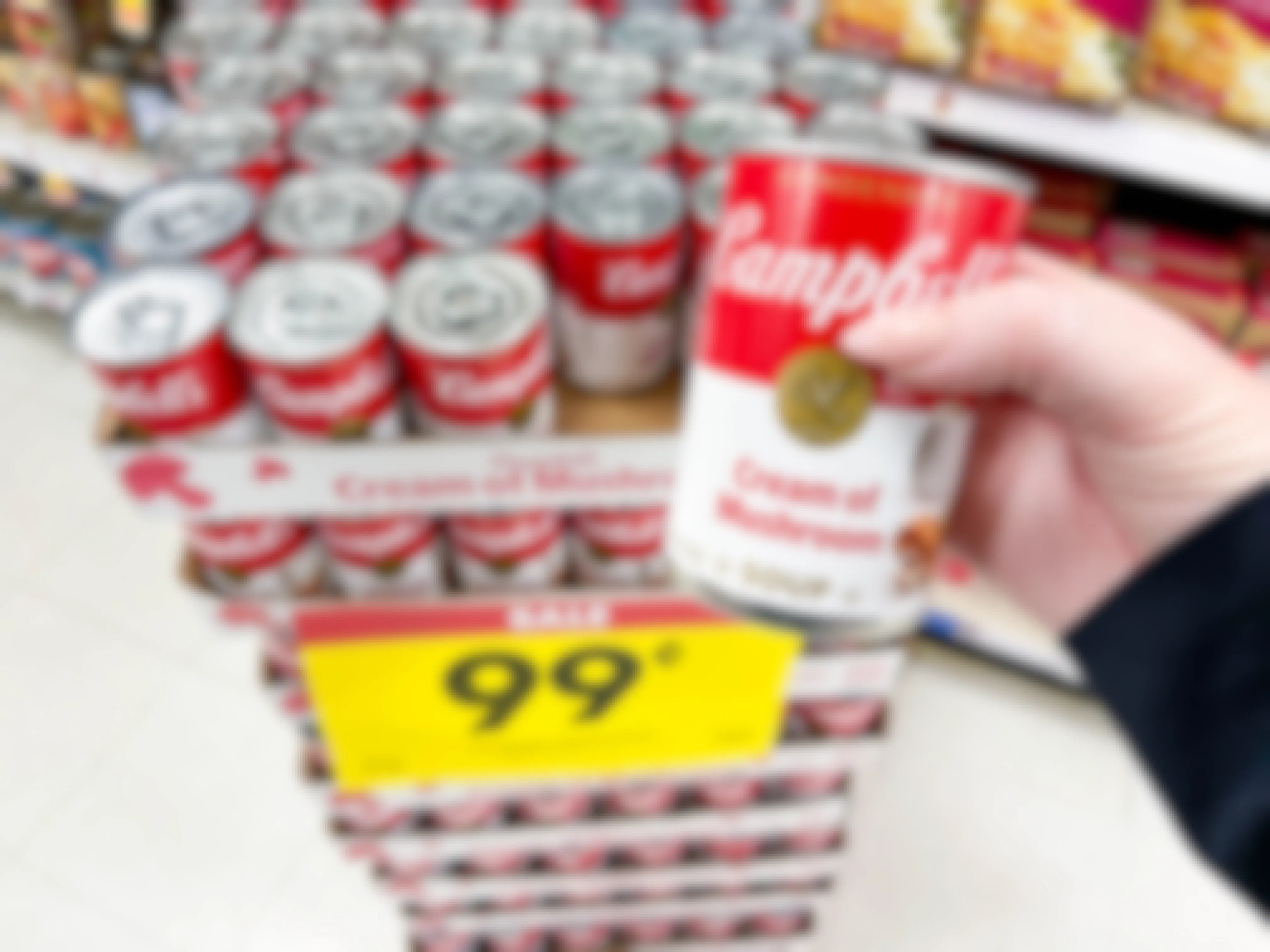 grabbing canned soup on sale