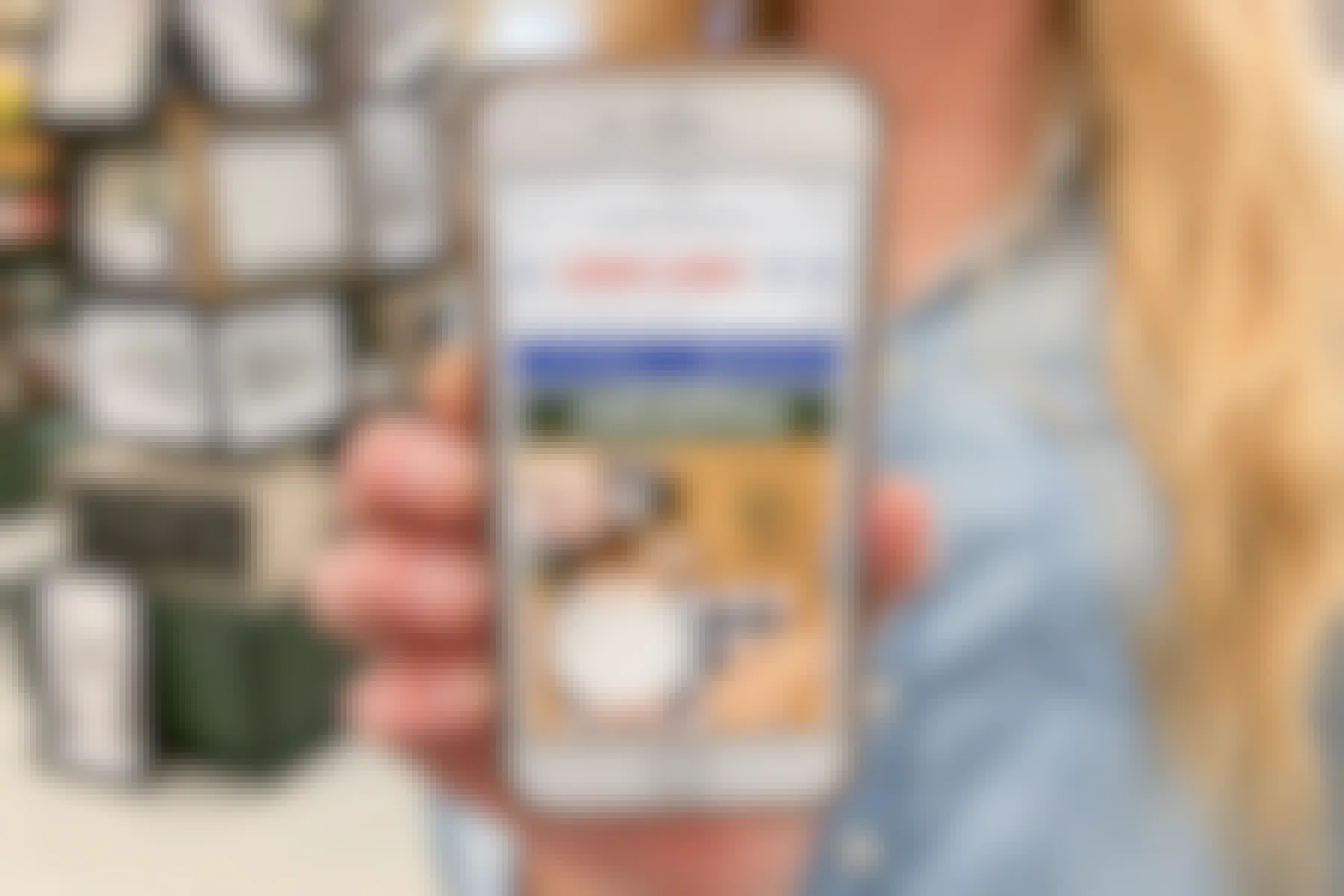 A cell phone screen showing Hobby Lobby's home page featuring a free shipping offer.
