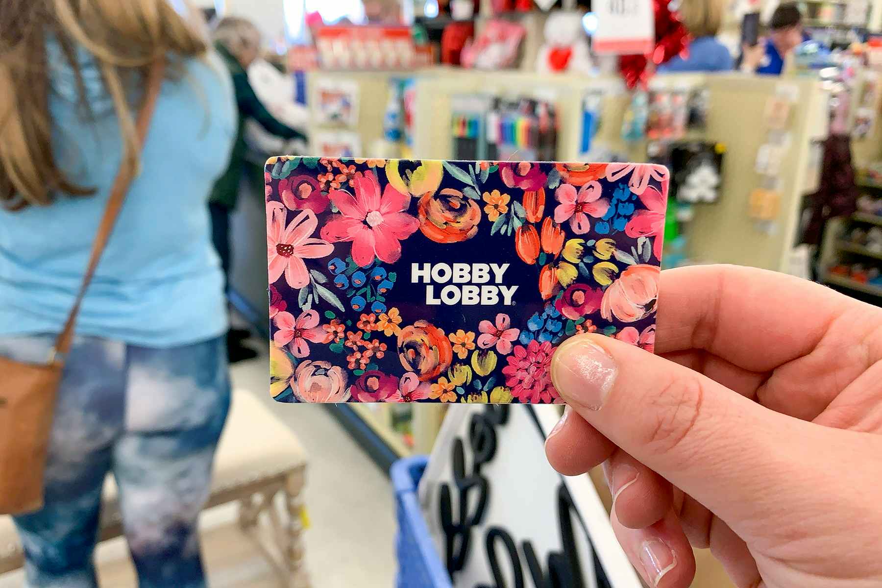 A close up of a Hobby Lobby gift card near the register.