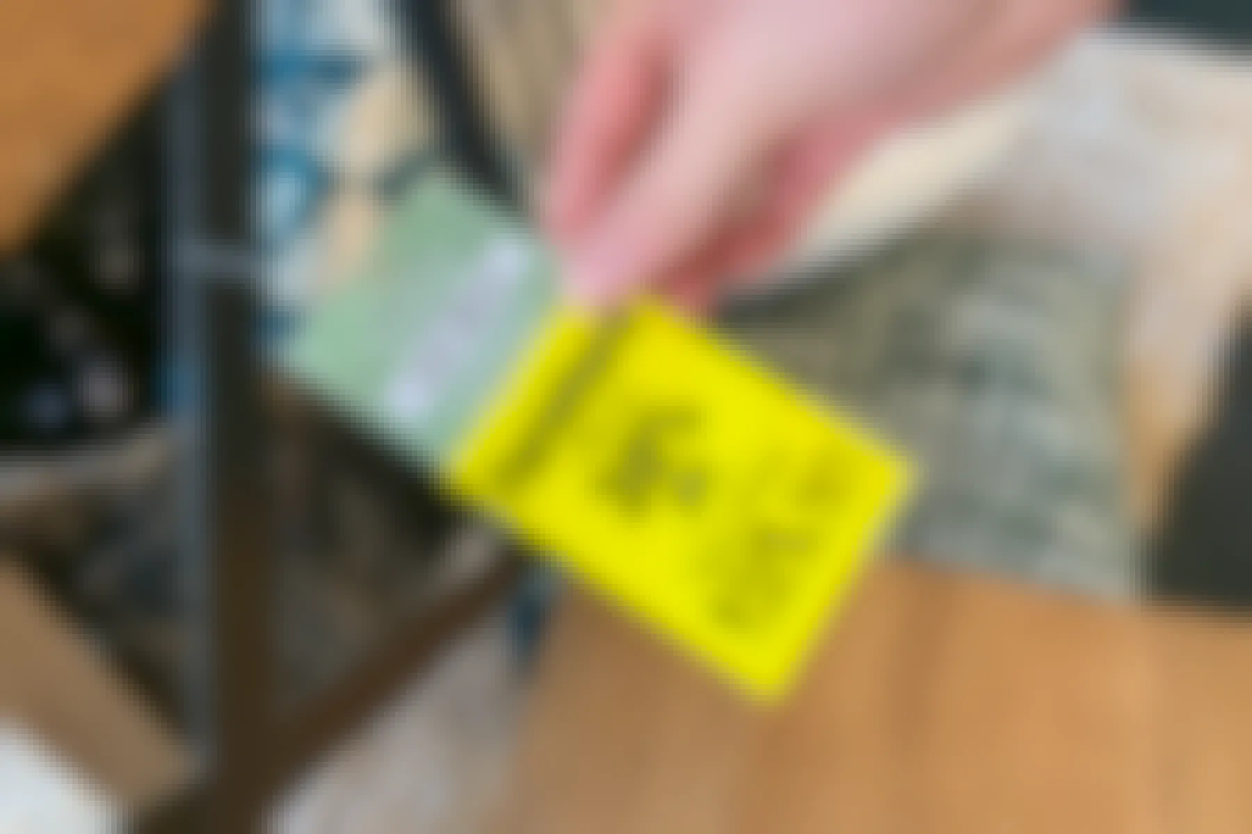 A yellow furniture tag that reads "furniture alway 30% off".
