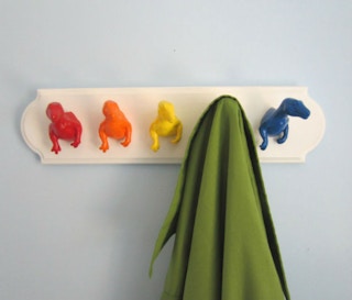 Build a coat rack with dinosaur heads.