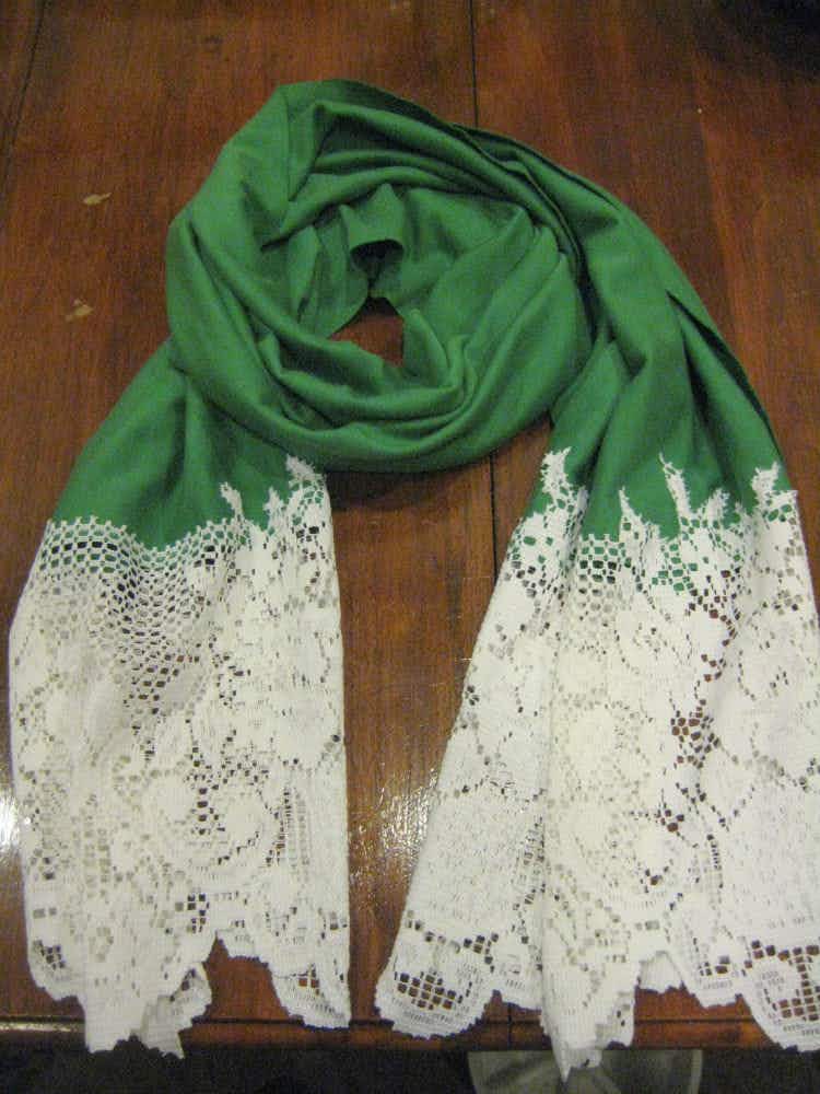Add length and style to a plain scarf with lace.
