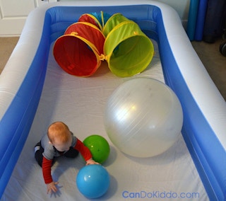 Turn an inflatable pool into a play pen.