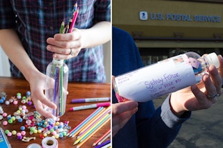 A person putting pencils into a plastic bottle.