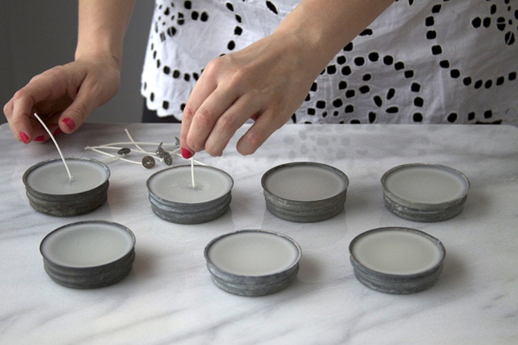 Create candles by pouring wax into them.