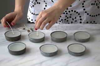Create candles by pouring wax into them.