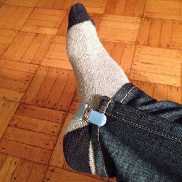 Keep jeans tucked into boots with a mitten clip.